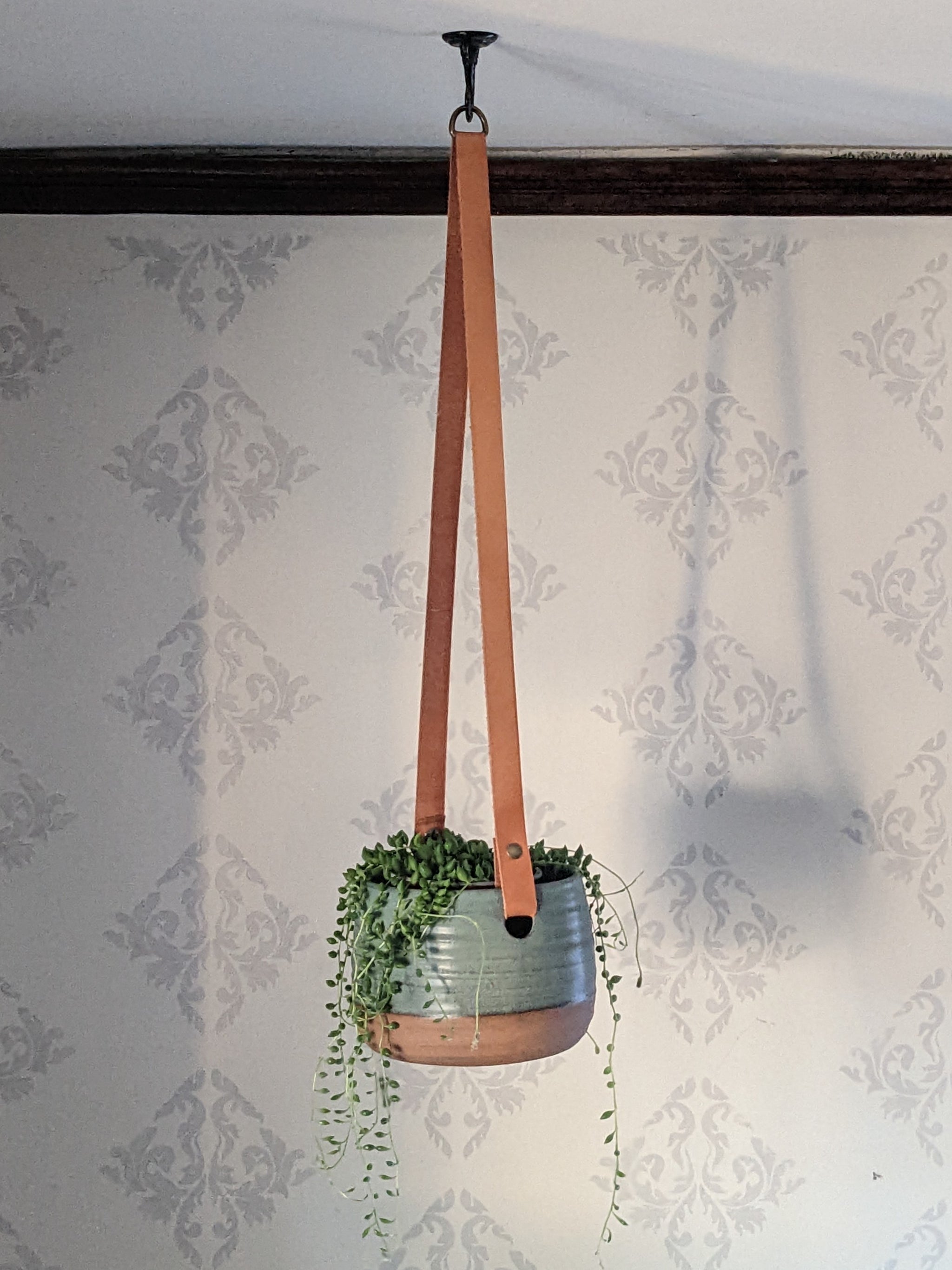 hanging planter with leather strap hanging planter – night shift stoneware
